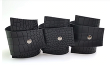 Load image into Gallery viewer, Black Etched Snake Skin Vegan Leather Wrap &amp; Snap Cuff
