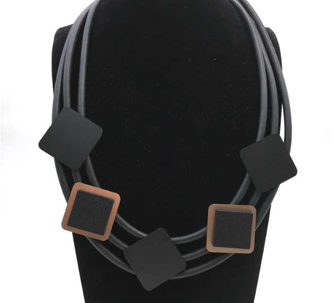 Black Triple Strand Rolled Rubber Aluminum Black & Rose Gold Squares Necklace